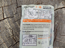 Load image into Gallery viewer, Survival - Stretch Wrap And Tuck - Tourniquet - Package Instructions - Wilderness Survival Systems : Picture