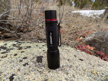 Load image into Gallery viewer, Survival light - Coast HX5 Sitting up - Wilderness Survival Systems : Picture