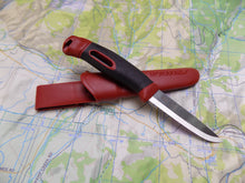 Load image into Gallery viewer, Wilderness Survival Knife - Mora companion spark on a map background - Wilderness Survival Systems : Picture
