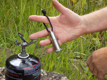Load image into Gallery viewer, Lighter - Peanut XL Lighter Titanium in hand - Wilderness Survival Systeam : Picture